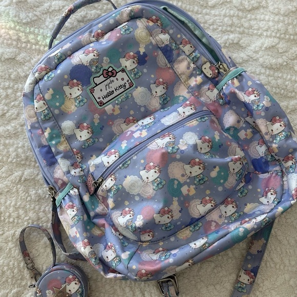 hello kitty diaper backpack x JuJuBe Zealous (Cherry Blossoms) Hello Kitty and JuJuBe team up once again to bring you this special Hello Kitty Pink Backpack 16"